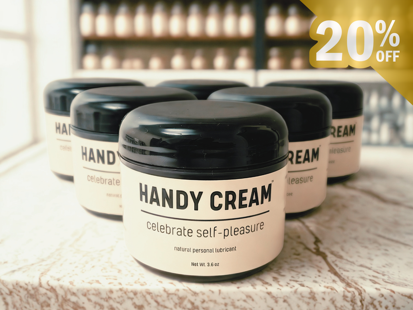 Jars of Handy Cream with a 20% off label in the background