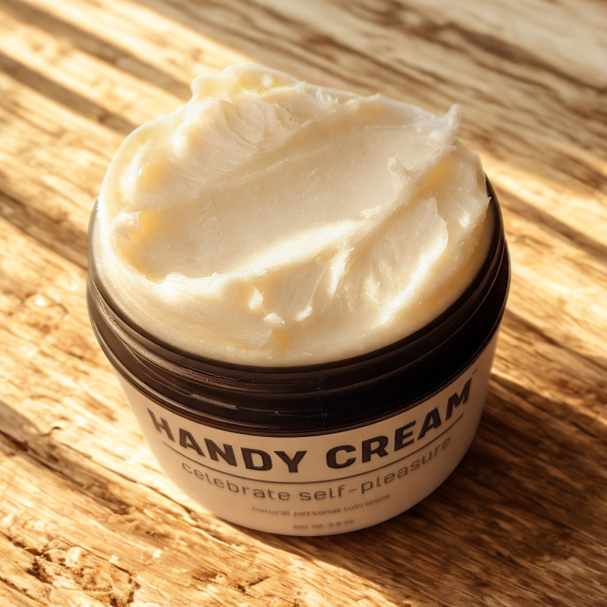Jar of Handy Cream on a wooden surface